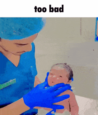a doctor is holding a newborn baby in his arms with the words too bad above him