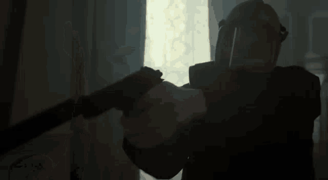 a man in a black shirt is flying through the air .