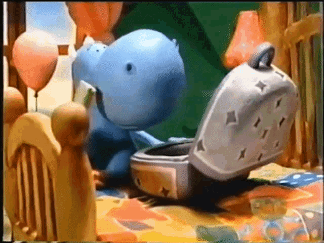 Dragon Packing Things GIF - Dragon Packing Things Pack My Bags GIFs