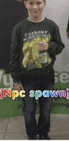 a boy wearing a shirt that says npc spawn on it