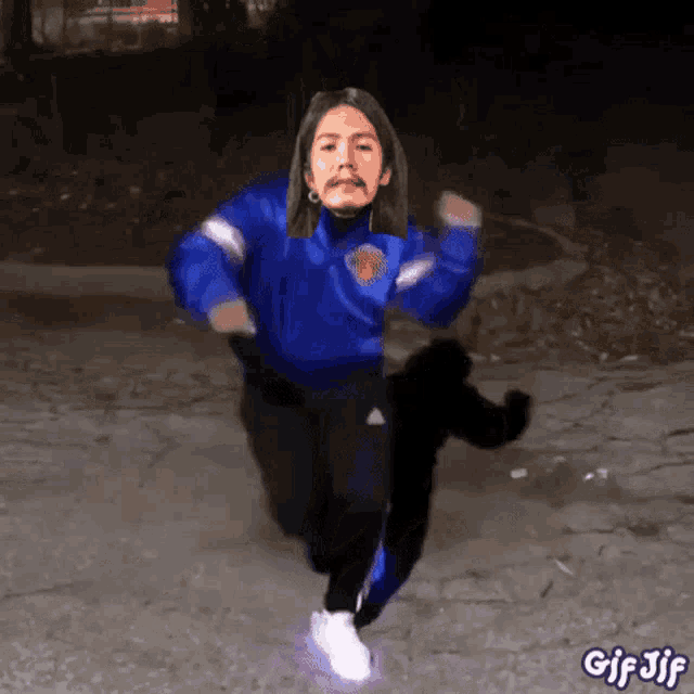 a gif of a person wearing a new york knicks sweatshirt