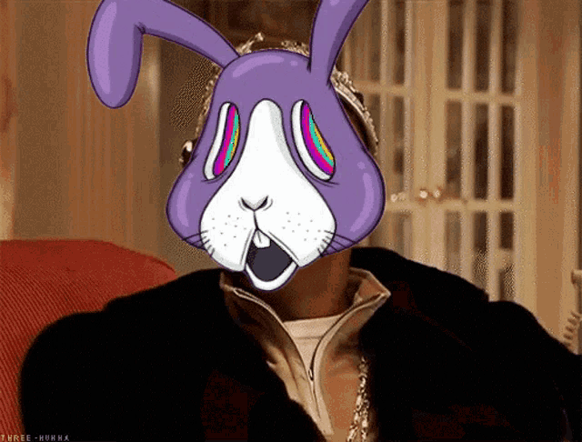 a person wearing a purple bunny mask with a crown on their head