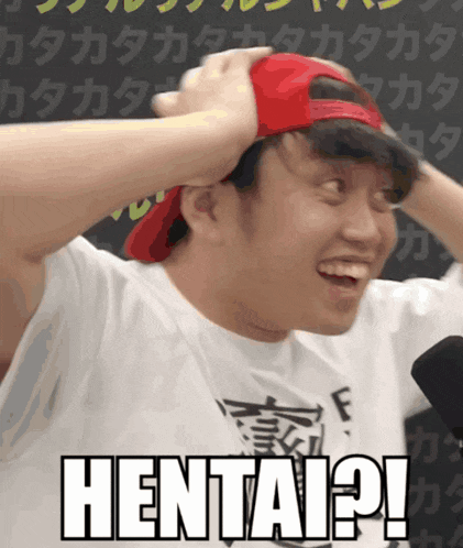 a man wearing a red hat and a white shirt has hentai written on his chest