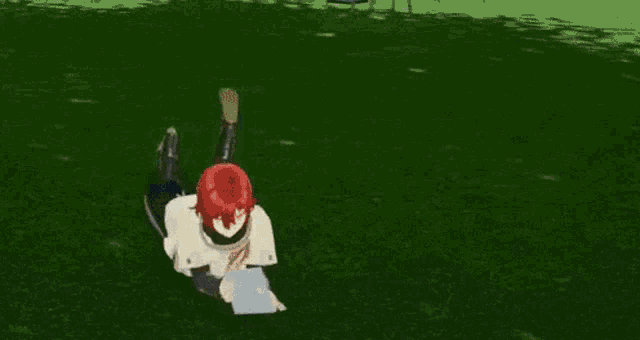 a person is laying on their stomach in a field with a blue light coming out of their head .