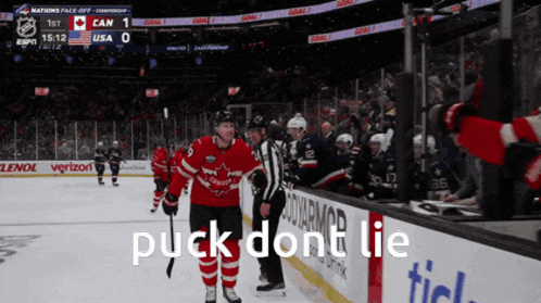 a hockey player walks off the ice with the words puck dont lie written on the side