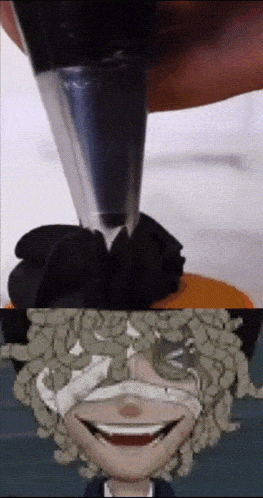 a close up of a person icing a cake and a close up of a cartoon character