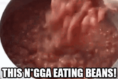 a close up of a bowl of beans with the words `` this n * gga eating beans '' written on it .