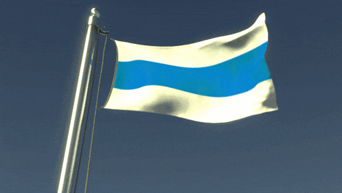 a white and blue flag is flying in the wind