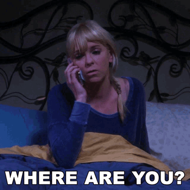 a woman laying in bed talking on a cell phone with the words " where are you " above her