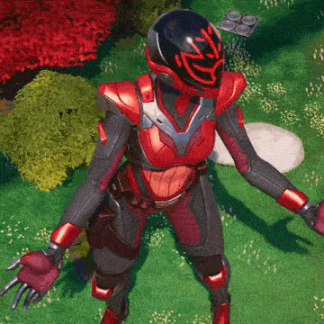 a female superhero is standing in the grass with her arms outstretched .