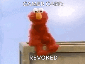 elmo from sesame street is sitting on the edge of a building and says gamer card revoked .
