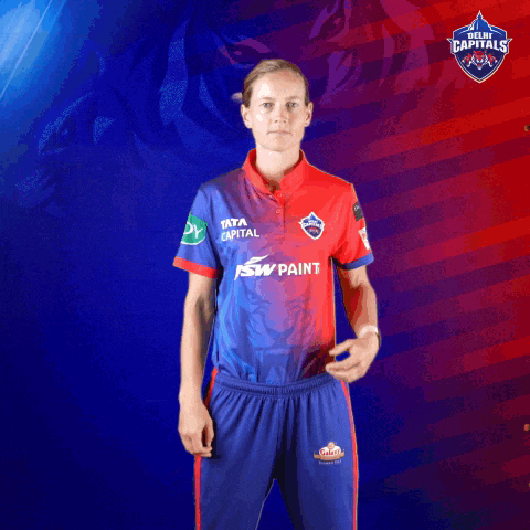 a woman is wearing a jersey that says tata capital on it