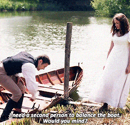 a man and a woman standing next to a boat with the words " i need a second person to balance the boat " on the bottom