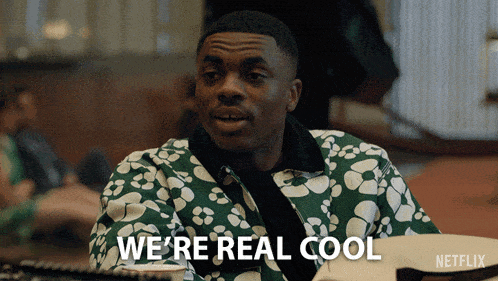 a man in a green jacket says " we 're real cool " in front of a netflix logo