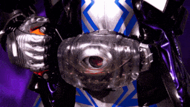 a close up of a person 's waist with a belt that has a clear eye on it