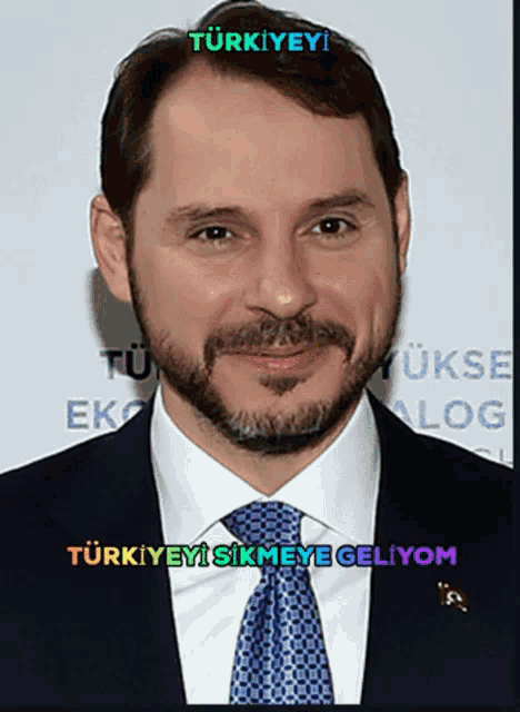 a man in a suit and tie with the words turkeyeyi on top