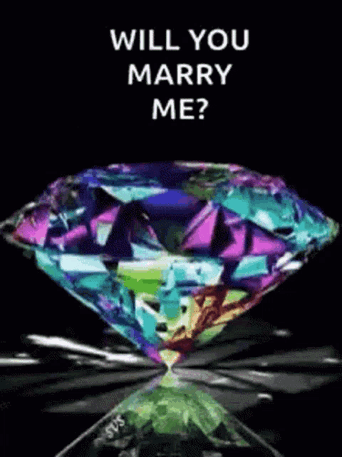 a colorful diamond with the words will you marry me on it