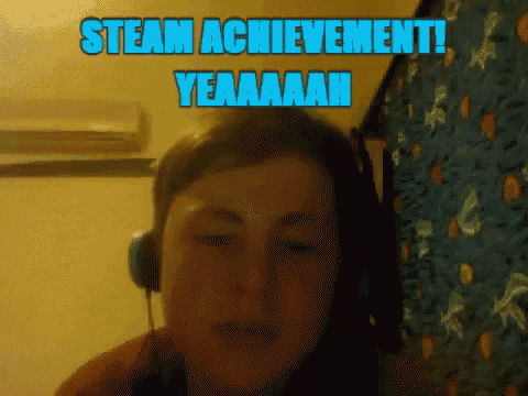 a man wearing headphones says steam achievement yeaaah