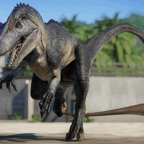 a gray and brown dinosaur with a long tail is running