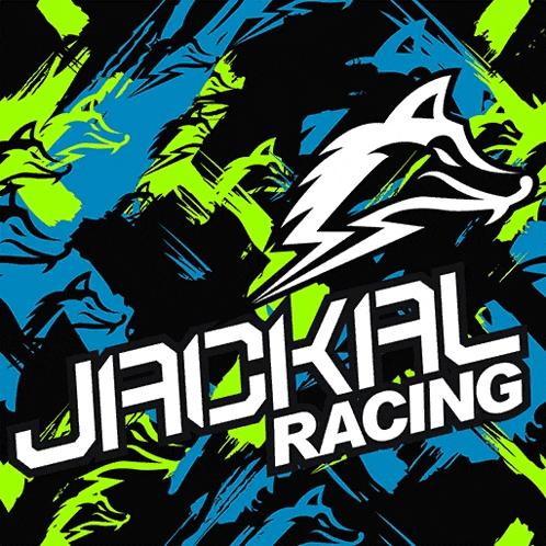 a logo for jadkal racing with a shark on a blue and green background
