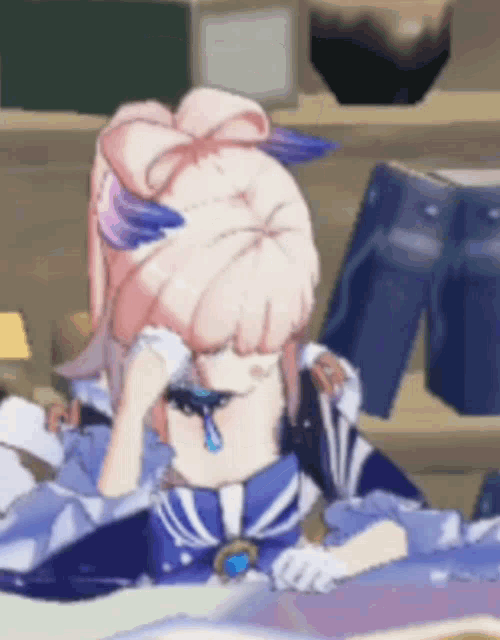a girl with pink hair and blue eyes is sitting on a table in a video game .