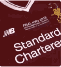 a maroon shirt that says standard chartered on the front