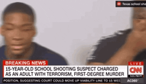 a cnn breaking news report about a 15 year old school shooting suspect charged as an adult with terrorism