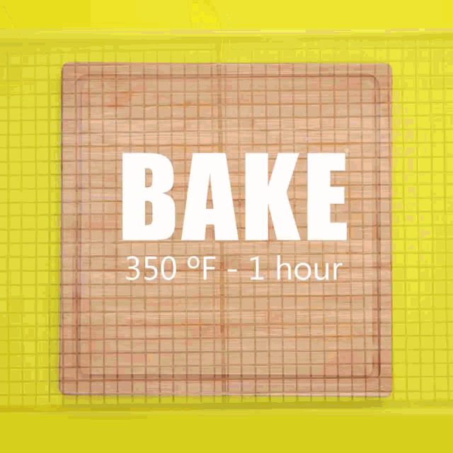 a person is holding a doughnut on a cooling rack