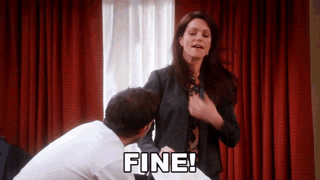 a man is kneeling down next to a woman who is saying " fine "