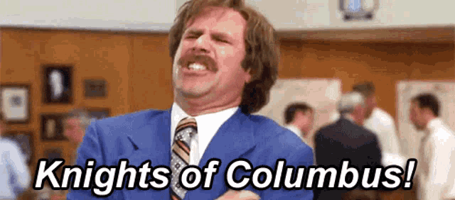 a man in a suit and tie with the words knights of columbus written below him