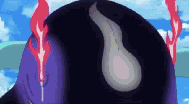 a close up of a cartoon character 's butt with red flames coming out of it .