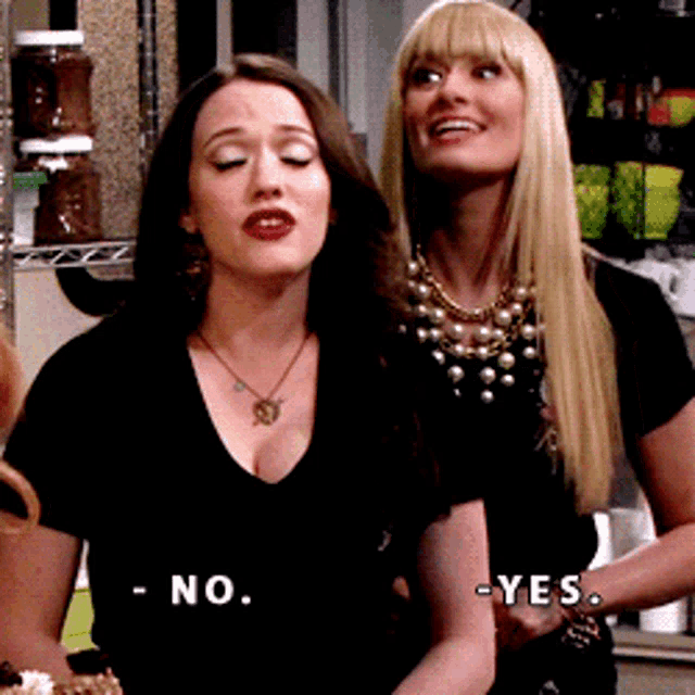 two women standing next to each other with one saying no