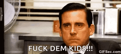 a man in a suit and tie is saying `` fuck dem kids '' while sitting at a desk .