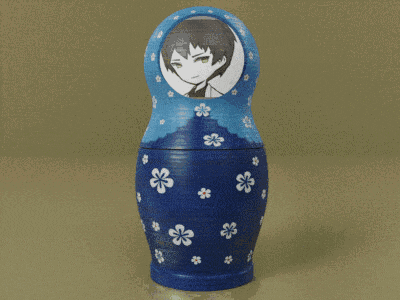 a blue green and orange russian nesting doll with flowers on them