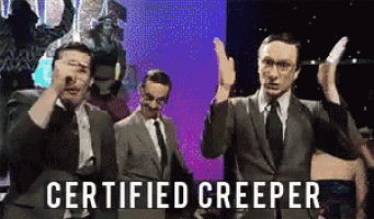 a group of men in suits and ties are dancing in front of a sign that says " certified creeper "