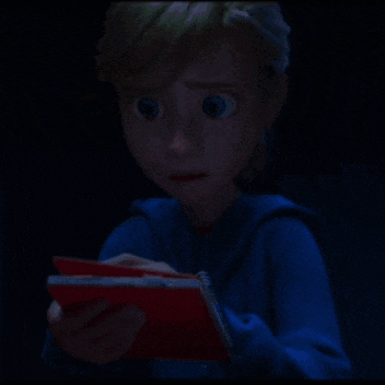 a person in a blue shirt is holding a red book that says ' i love you '