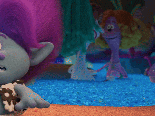 a troll with purple hair is standing in front of a pool