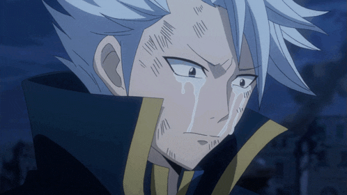 a close up of a person 's face with a tear running down their face