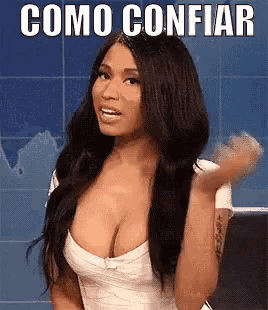 a woman with a large breast is wearing a white dress