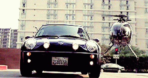 The Italian Job Helicopter Chase GIF - The Italian Job Helicopter Chase Chased GIFs