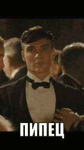 a man in a tuxedo and bow tie is standing in a crowd of people with a caption in russian .