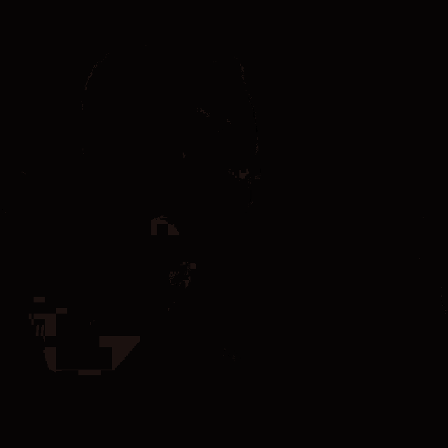 a man wearing a black shirt with a white x on it