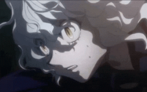 a close up of a person 's face with a shadow on it .