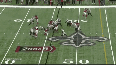 a football game is being played on a field with the word omg on the field