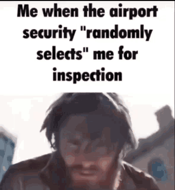 a man is standing in front of a sign that says `` me when the airport security randomly selects ''