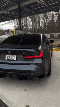 a gray bmw with a new jersey license plate