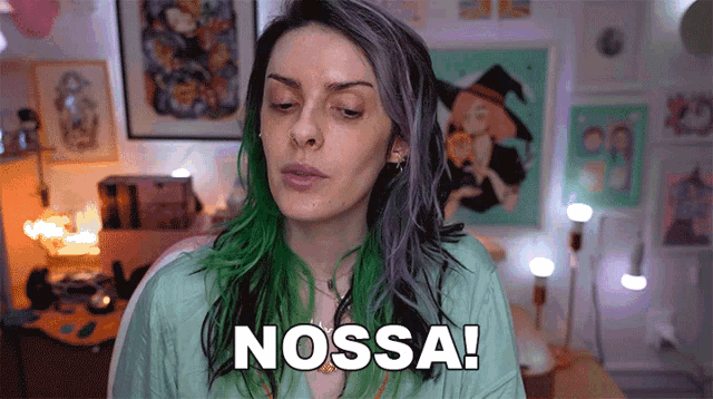 a woman with green hair says " nossa " in a room