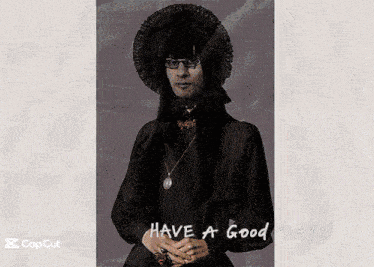 a picture of a woman in a black dress with the words have a good day