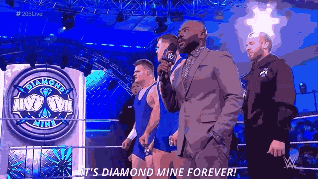 a man in a suit stands in front of a sign that says diamond mine forever