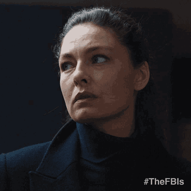 a close up of a woman 's face with #thefbls written on the bottom